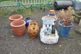 A COLLECTION OF SEVENTEEN PLANT POTS including a pair of Terracotta coloured pots 42cm in
