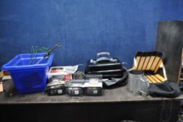 A WEBER PORTABLE BARBECUE appears unused, in bag with a tray containing utensils, lighter cubes,