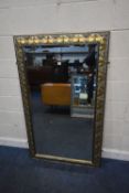 A GILT AND SILVERED RECTANGULAR BEVELLED EDGE MIRROR, 153cm x 92cm, condition report: minor knocks