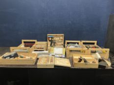 EIGHT WOODEN TRAYS AND BOXES CONTAINING TOOLS including wood chisels, a MAB focusing rack, a wood