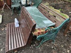A MODERN GARDEN BENCH with cast iron ends and hardwood slatted seat and back, 128cm wide and a