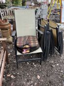 A SET OF FOUR BLACK FINISH ALUMINIUM AND FABRIC FOLDING GARDEN CHAIRS with seat cushions.