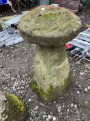 A RED SANDSTONE STADDLE STONE with top, total height 90cm, top diameter, Condition Report; chips and