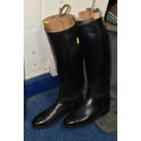 A PAIR OF HORACE BATTEN OF NORTHAMPTON 'HUNTING AND POLO BOOTS' approximately size 7, wooden boot