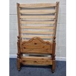 A MODERN PINE SINGLE BEDSTEAD, with side rails, slats and bolts, condition report: dismantled,