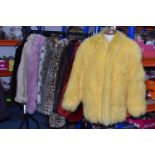 A GROUP OF EIGHT LADIES' VINTAGE DRESS COATS, comprising a Peltax yellow Mongolian lambs fur coat,