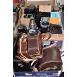 TWO BOXES OF VINTAGE PHOTOGRAPHIC EQUIPMENT to include a box containing a Bell & Howell Autoset