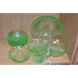 A URANIUM GLASS FRUIT SET, comprising fruit bowl, cream jug, sugar bowl and six individual bowls,