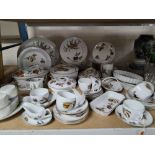 A ROYAL WORCESTER 'EVESHAM' PATTERN AND SIMILAR DINNER SERVICE comprising a large oval platter,