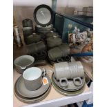 A DENBY 'CHEVRON' PATTERN DINNER SERVICE DESIGNED BY GILL PEMBERTON comprising eight dinner