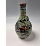 A 19TH CENTURY CHINESE EXPORT CLOBBERED BOTTLE VASE, originally a blue and white chinese vase