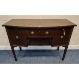 AN EARLY 20TH CENTURY MAHOGANY BOW FRONT SIDEBOARD, fitted with two drawers, flanked by double