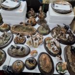 A GROUP OF COUNTRY ARTISTS ANIMALS AND COLLECTORS PLATES featuring mostly dogs and British wildlife,