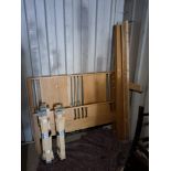 A LIGHT OAK 4FT6 BEDSTEAD, with siderails, slats, bolts and a bespoke central beam Condition
