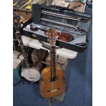 A GROUP OF THREE MUSICAL INSTRUMENTS comprising a Stentor Conservatoire violin with finely carved