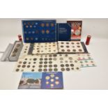 A plastic box containing a Whitman Coin Album 'Great Britain Minor Type Set' coins inside, including