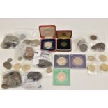 A collection of coins to include silver coins post-1920, pre-1947, to 106 grams, including a BU 1935