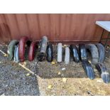 A COLLECTION OF VINTAGE BRITISH MOTORCYCLE MUDGUARDS, including what appears to be an original black