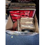 ONE BOX OF VINYL RECORDS consisting of 7" singles and albums mostly from the punk era including
