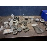 A TRAY CONTAINING VINTAGE MOTORCYCLE PARTS including two pairs of AJS tank knee pads with mounting