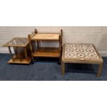 A G PLAN TEAK TILE TOP COFFEE TABLE, a two-tier trolley, along with another trolley with various