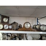 A GROUP OF VINTAGE CLOCKS FOR RESTORATION, comprising three Napoleon hat style mantel clocks, a