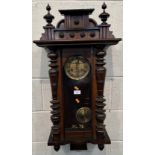 A 20TH CENTURY WALL CLOCK, with an arched glass door, thats enclosing a 5.5 inch dial Dimensions: