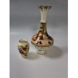 TWO VINTAGE PIECES OF ROYAL WORCESTER comprising a lamp base hand-painted in lamp base, circa