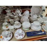 A GROUP OF TEA WARES, to include a Minton Petunia tea set, comprising two cake plates, a milk jug, a
