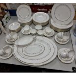 A SEVENTY-FIVE PIECE ROYAL WORCESTER 'GOLD CHANTILLY' PART DINNER SET, comprising two oval meat