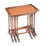 WALNUT NEST OF THREE TEA TABLES