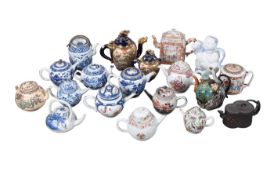COLLECTION OF CHINESE & JAPANESE TEA POTS