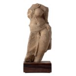 A sandstone fragmentary bust of a female deity, Possibly North India, 12-14th century,  wearing ...