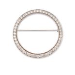 A diamond brooch, of hoop form, set with brilliant-cut diamonds, stamped 18K, diameter 3.8cm