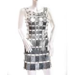 Paco Rabanne.  A rare and vintage armour dress 1967, printed black paper label, of chain-linked ...