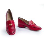 Mulberry. A pair of Penny loafers, of red buffalo leather, detailed with gold-toned hardware and...