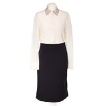 Prada.  A collection of womenswear, to include an ivory shirt with a rhinestone design across th...