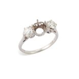 A diamond ring mount, composed of a central circular vacant collet, with brilliant-cut diamond si...