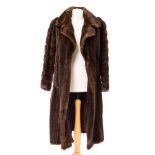 A Collection of Simulated Fur Coat, to include: a Havane long simulated fur coat, another Gris Fu...