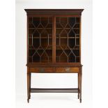 A George III mahogany upper section of bureau bookcase, last quarter 18th century, the moulded de...