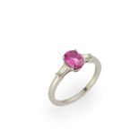 Bulgari. A platinum pink sapphire and diamond ring, the oval mixed cut pink sapphire in a claw se...