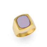 Bulgari. A sardonyx signet ring, the cushion shaped sardonyx tablet to polished bezel, tapering s...