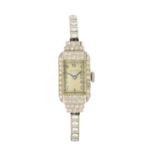 Movado. A platinum and diamond set manual wind cocktail watch  Circa 1950 Jewelled manual wind mo...