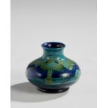 William Moorcroft (1872-1945)  'Moonlit' pattern miniature vase, circa 1920    Glazed earthenwar...