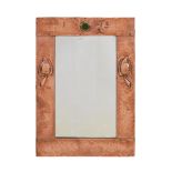 Manner of Liberty & Co.  Arts & Crafts wall mirror, circa 1910  Hammered and repousse-work coppe...