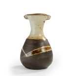 Janet Leach (1918-1997)  Vase with lugs, circa 1980  Stoneware with dry brown body, white glaze ...