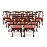 A set of fourteen English mahogany dining chairs, of George III style and in the manner of Thomas...
