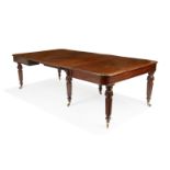 A George IV mahogany extending dining table, second quarter 19th century, the rectangular top wit...