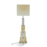A chromed steel and brass floor lamp, circa 1970, attributed to Willy Rizzo, 148cm high  It is t...