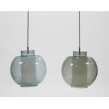 A pair of Scandinavian smoky and opaline glass ceiling lights, c.1960, 175cm high (2)  It is the...